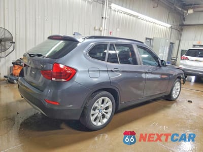 Trzecie zdjęcie samochodu z tyłu: 2013 BMW X1 XDRIVE28I VIN:WBAVL1C53DVR86222 - miniatura