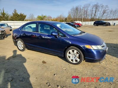 Czwarte zdjęcie samochodu z boku: 2006 HONDA CIVIC LX VIN:2HGFA165X6H523497 - miniatura