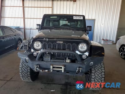 Piąte zdjęcie samochodu w środku: 2017 JEEP WRANGLER UNLIMITED RUBICON VIN:1C4BJWFG2HL610490 - miniatura