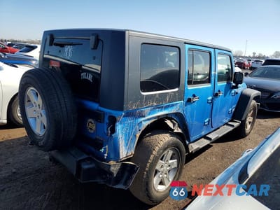 Trzecie zdjęcie samochodu z tyłu: 2010 JEEP WRANGLER UNLIMITED SPORT VIN:1J4HB3H15AL214469 - miniatura