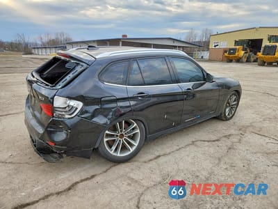 Trzecie zdjęcie samochodu z tyłu: 2015 BMW X1 XDRIVE35I VIN:WBAVM5C54FVV94728 - miniatura