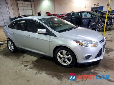 Czwarte zdjęcie samochodu z boku: 2013 FORD FOCUS SE VIN:1FADP3F24DL262265 - miniatura