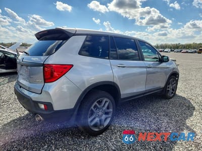 Trzecie zdjęcie samochodu z tyłu: 2022 HONDA PASSPORT EXL VIN:5FNYF8H59NB022426 - miniatura