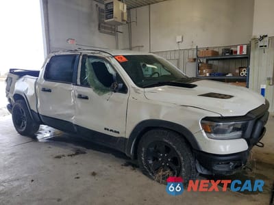 Czwarte zdjęcie samochodu z boku: 2023 RAM 1500 REBEL VIN:1C6SRFLT9PN578352 - miniatura