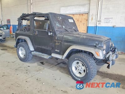 Czwarte zdjęcie samochodu z boku: 2002 JEEP WRANGLER / TJ SPORT VIN:1J4FA49S12P706689 - miniatura