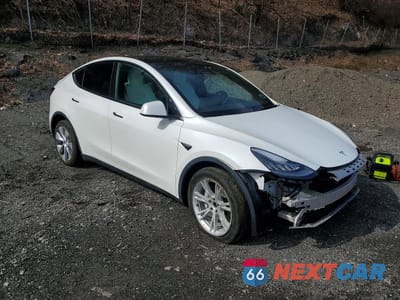 Czwarte zdjęcie samochodu z boku: 2022 TESLA MODEL Y VIN:7SAYGDEE6NF373730 - miniatura