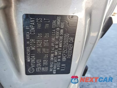 Zdjęcie 12 z 13 samochodu: 2003 HYUNDAI ACCENT BASE VIN:KMHCF35C13U260030 - miniatura