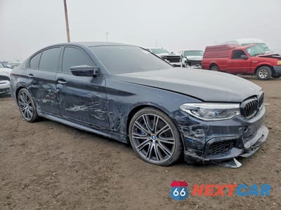 Czwarte zdjęcie samochodu z boku: 2018 BMW M550XI VIN:WBAJB9C5XJB286968 - miniatura