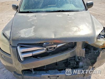 Zdjęcie 12 z 13 samochodu: 2006 HONDA PILOT EX VIN:2HKYF18666H525530 - miniatura
