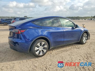 Trzecie zdjęcie samochodu z tyłu: 2023 TESLA MODEL Y VIN:7SAYGDEE7PF620188 - miniatura