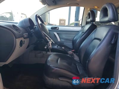 Zdjęcie 7 z 11 samochodu: 2002 VOLKSWAGEN NEW BEETLE GLS VIN:3VWCB21C62M420435 - miniatura