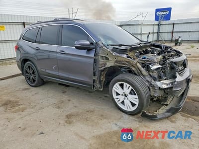 Czwarte zdjęcie samochodu z boku: 2022 HONDA PILOT SE VIN:5FNYF6H2XNB055767 - miniatura