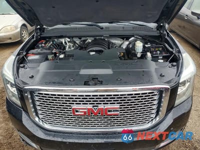 Zdjęcie 11 z 11 samochodu: 2015 GMC YUKON XL DENALI VIN:1GKS2JKJ0FR208919 - miniatura