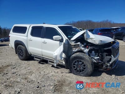 Czwarte zdjęcie samochodu z boku: 2022 NISSAN FRONTIER PRO-4X VIN:1N6ED1EK1NN679763 - miniatura