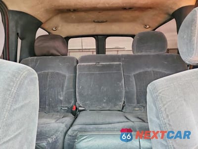 Zdjęcie 10 z 13 samochodu: 2002 CHEVROLET TAHOE C1500 VIN:1GNEC13V22R181571 - miniatura