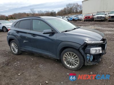 Czwarte zdjęcie samochodu z boku: 2018 HYUNDAI KONA SEL VIN:KM8K6CAA6JU085674 - miniatura