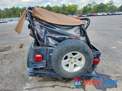 Zdjęcie 6 z 13 samochodu: 1997 JEEP WRANGLER / TJ SE VIN:1J4FY29P8VP412688 - miniatura
