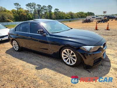 Czwarte zdjęcie samochodu z boku: 2016 BMW 320 I VIN:WBA8E1G57GNT37318 - miniatura