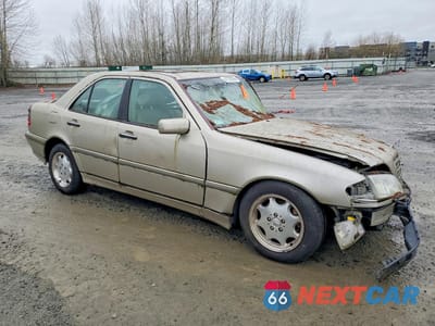 Czwarte zdjęcie samochodu z boku: 1999 MERCEDES-BENZ C 280 VIN:WDBHA29G4XA706192 - miniatura