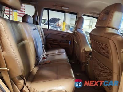 Zdjęcie 11 z 12 samochodu: 2004 HONDA PILOT EXL VIN:2HKYF185X4H525857 - miniatura