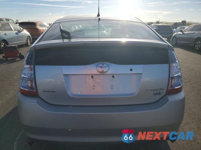 Zdjęcie 6 z 12 samochodu: 2004 TOYOTA PRIUS BASE VIN:JTDKB20UX40017461 - miniatura