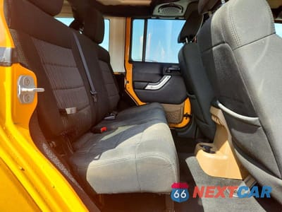 Zdjęcie 11 z 12 samochodu: 2012 JEEP WRANGLER UNLIMITED SAHARA VIN:1C4BJWEGXCL133897 - miniatura