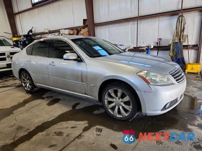 Czwarte zdjęcie samochodu z boku: 2007 INFINITI M35 X VIN:JNKAY01F87M451792 - miniatura