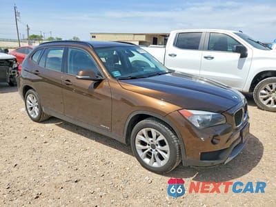 Czwarte zdjęcie samochodu z boku: 2014 BMW X1 XDRIVE28I VIN:WBAVL1C59EVY21096 - miniatura