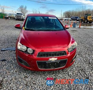 Piąte zdjęcie samochodu w środku: 2014 CHEV SONIC VIN:1G1JC5SH9E4222007 - miniatura