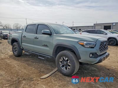Czwarte zdjęcie samochodu z boku: 2023 TOYOTA TACOMA TRD OFF-ROAD VIN:3TMCZ5AN0PM577516 - miniatura