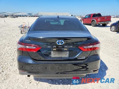Zdjęcie 6 z 11 samochodu: 2021 TOYOTA CAMRY HYBRID LE VIN:4T1C31AKXMU565263 - miniatura