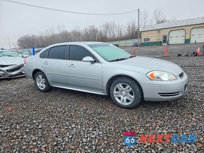 Czwarte zdjęcie samochodu z boku: 2014 CHEVROLET IMPALA LIMITED LT VIN:2G1WB5E33E1150600 - miniatura