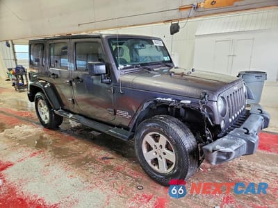 Czwarte zdjęcie samochodu z boku: 2016 JEEP WRANGLER UNLIMITED SPORT VIN:1C4BJWDGXGL219475 - miniatura