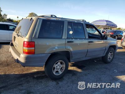 Trzecie zdjęcie samochodu z tyłu: 1996 JEEP GRAND CHEROKEE LAREDO VIN:1J4FX58SXTC294092 - miniatura