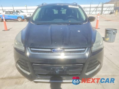 Piąte zdjęcie samochodu w środku: 2014 FORD ESCAPE TITANIUM VIN:1FMCU0J92EUE06887 - miniatura