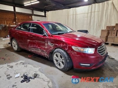 Czwarte zdjęcie samochodu z boku: 2014 FORD TAURUS SEL VIN:1FAHP2E81EG139292 - miniatura