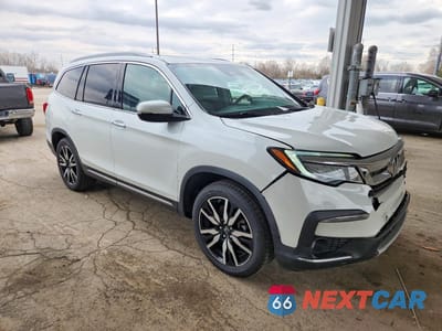 Czwarte zdjęcie samochodu z boku: 2020 HONDA PILOT TOURING VIN:5FNYF6H69LB022579 - miniatura