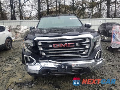 Piąte zdjęcie samochodu w środku: 2019 GMC SIERRA K1500 SLT VIN:3GTU9DED6KG276109 - miniatura
