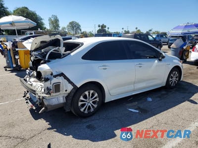 Trzecie zdjęcie samochodu z tyłu: 2021 TOYOTA COROLLA HYBRID LE VIN:JTDEAMDE0MJ009684 - miniatura