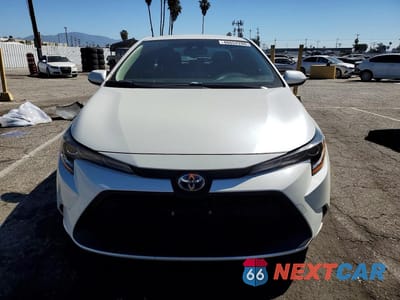 Piąte zdjęcie samochodu w środku: 2021 TOYOTA COROLLA HYBRID LE VIN:JTDEAMDE0MJ009684 - miniatura