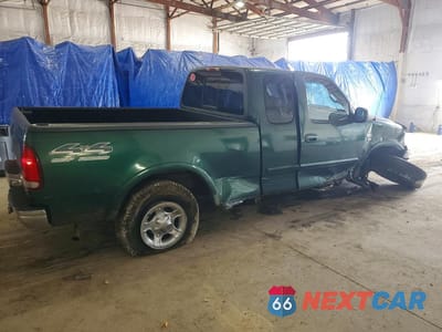 Trzecie zdjęcie samochodu z tyłu: 1999 FORD F150 VIN:1FTRX18L1XNA06068 - miniatura