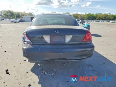 Zdjęcie 6 z 12 samochodu: 2004 FORD CROWN VICTORIA LX VIN:2FAFP74W04X116700 - miniatura