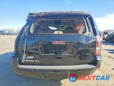 Zdjęcie 6 z 12 samochodu: 2015 GMC YUKON XL C1500 SLT VIN:1GKS1HKC6FR662041 - miniatura