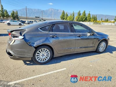 Trzecie zdjęcie samochodu z tyłu: 2015 FORD FUSION SE HYBRID VIN:3FA6P0LU1FR160889 - miniatura
