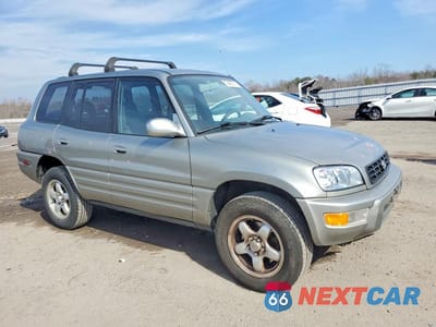 Czwarte zdjęcie samochodu z boku: 2000 TOYOTA RAV4 BASE VIN:JT3HP10V8Y7152406 - miniatura