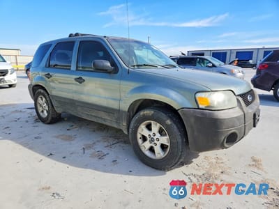 Czwarte zdjęcie samochodu z boku: 2006 FORD ESCAPE XLT VIN:1FMYU93136KD04769 - miniatura