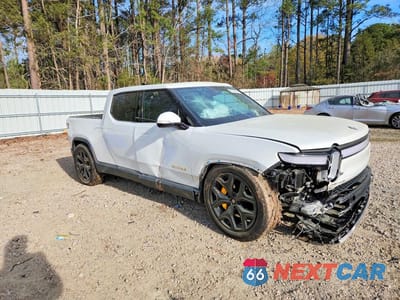 Czwarte zdjęcie samochodu z boku: 2022 RIVIAN R1T ADVENTURE VIN:7FCTGAAA2NN006568 - miniatura