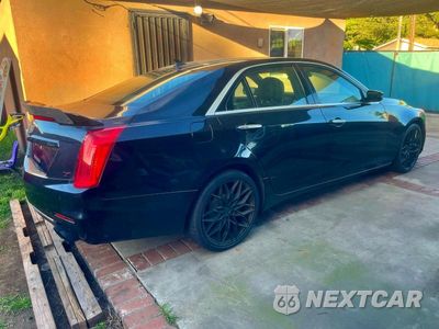 Czwarte zdjęcie samochodu z boku: 2014 CADILLAC CTS VSPORT PREMIUM VIN:1G6AV5S85E0161878 - miniatura