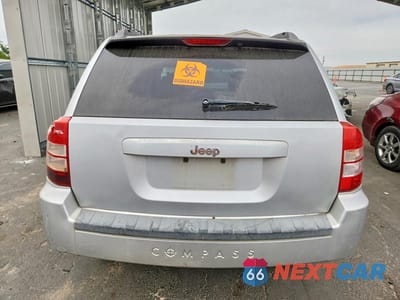 Zdjęcie 6 z 13 samochodu: 2010 JEEP COMPASS SPORT 4D SUV VIN:1J4NT4FB8AD560432 - miniatura