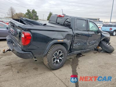 Trzecie zdjęcie samochodu z tyłu: 2025 GMC CANYON AT4 VIN:1GTP2DEK1S1228953 - miniatura